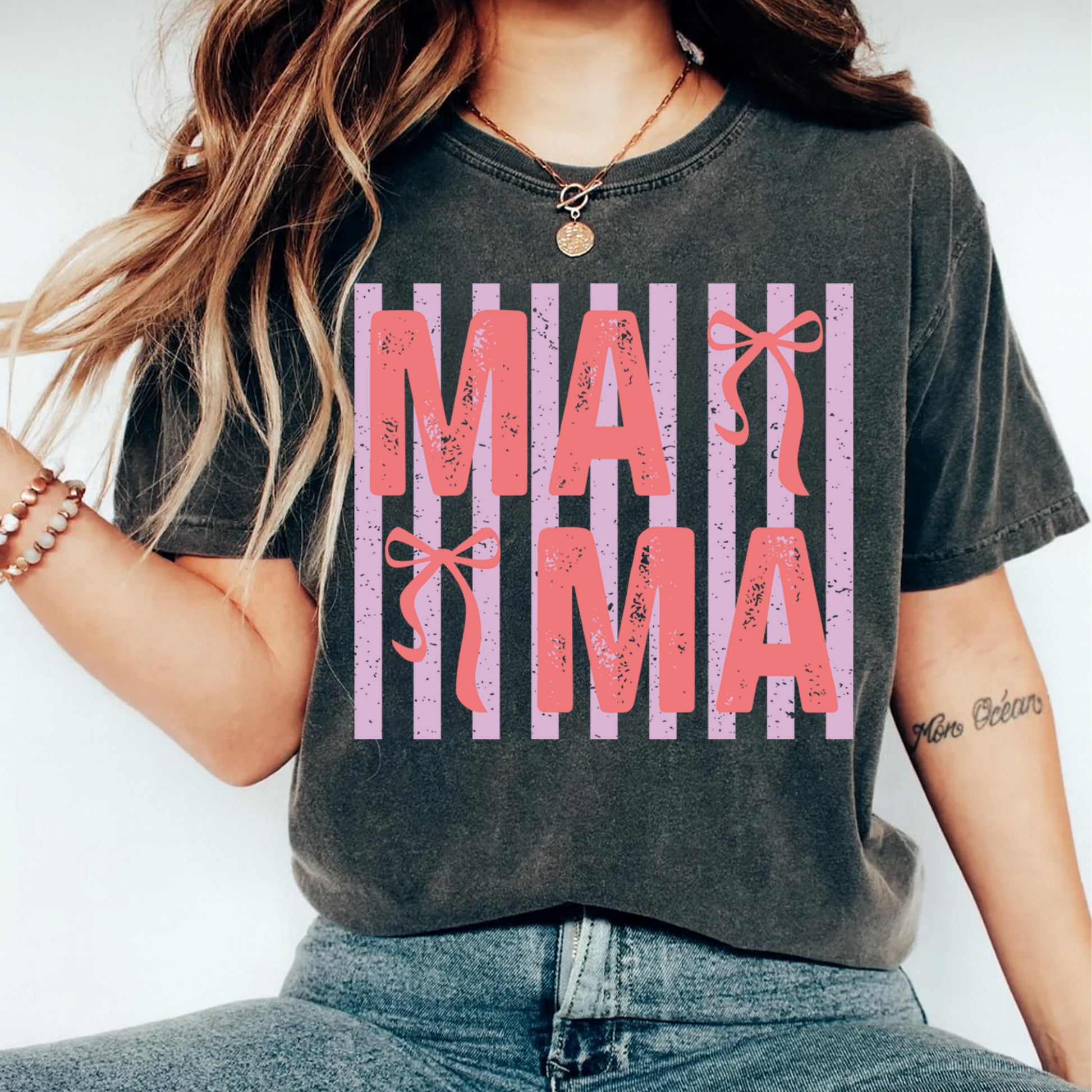 Black lifestyle T-shirt mockup with pink and lavender mama ready to press dtf transfer featuring bow accents.