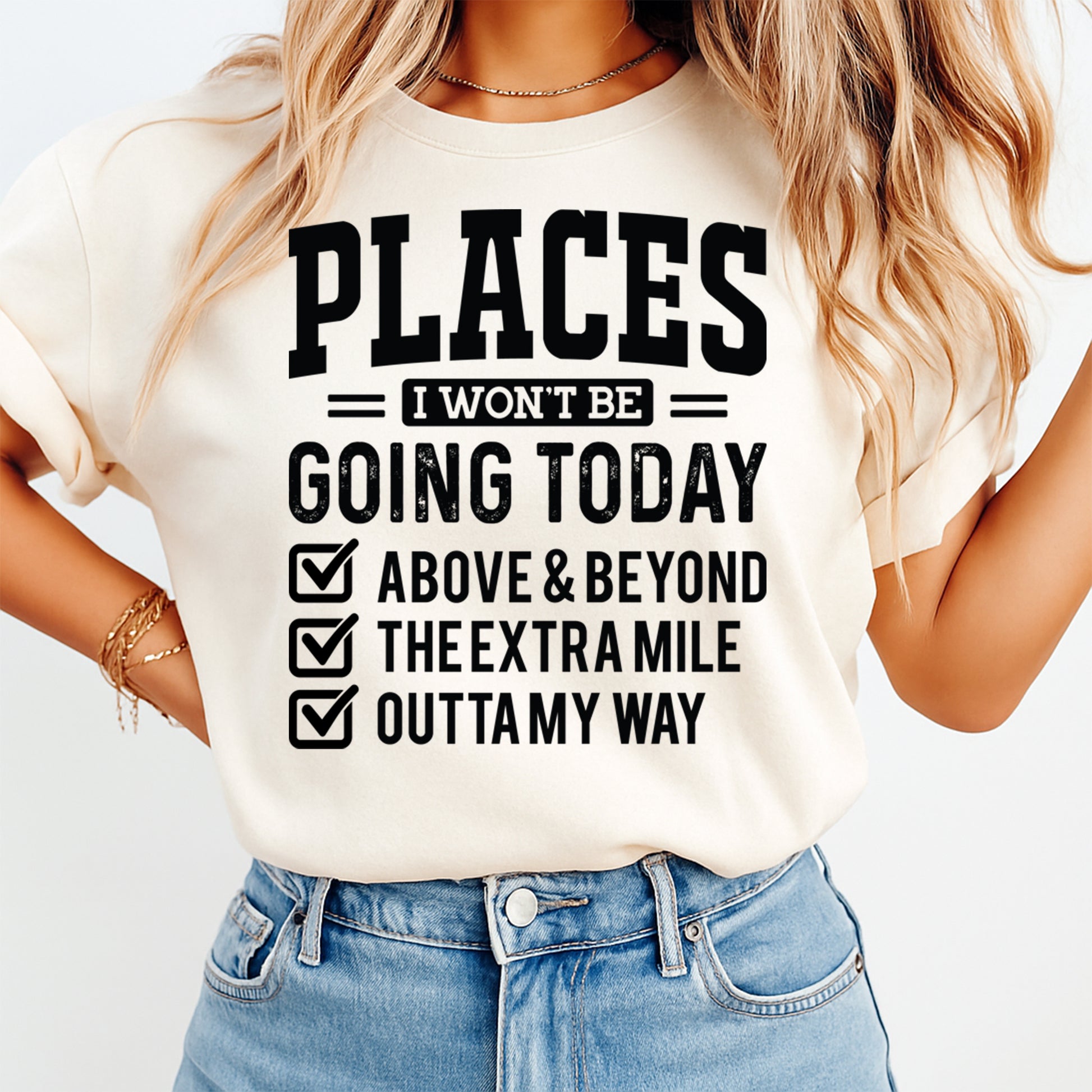 Lifestyle mockup of a cream shirt with a funny introvert ready to press dtf graphic that says Places I Won’t Be Going Today.