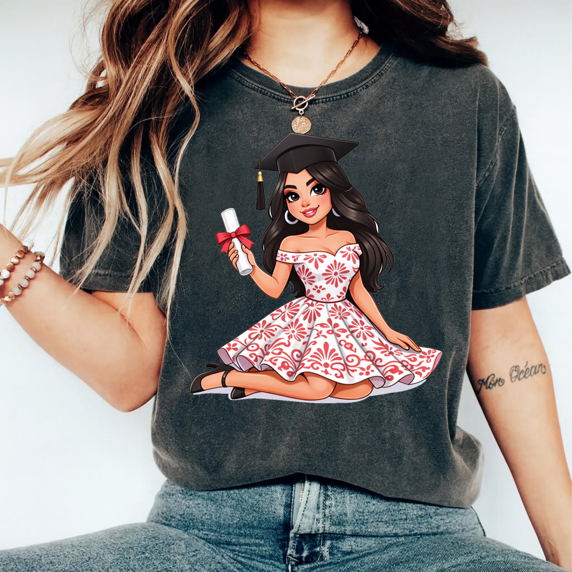 Latina graduate shirt mockup featuring a graduation cap, diploma, red floral dress, and ready to press dtf transfer artwork for DIY graduation shirts.