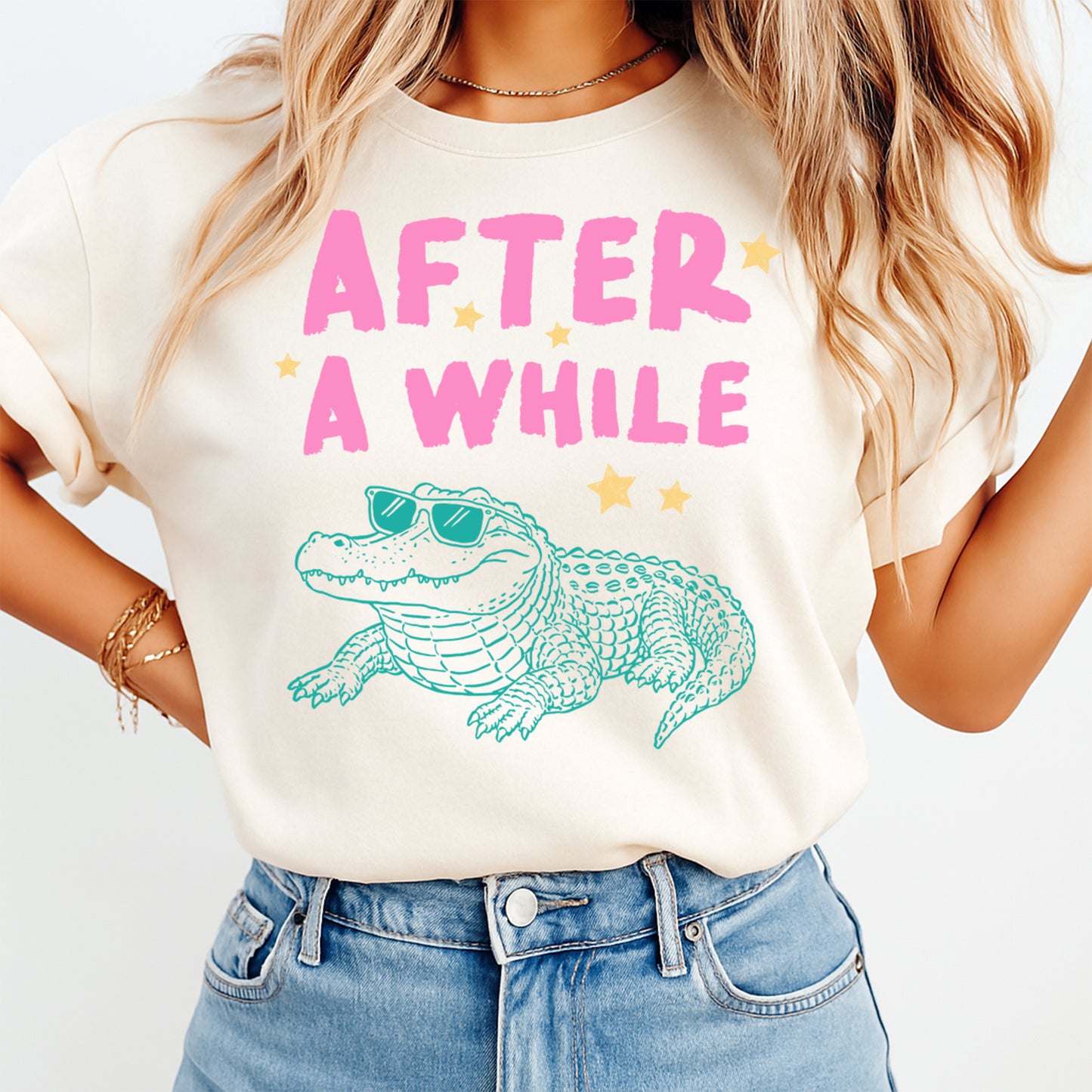 After a While alligator DTF transfer mockup on cream shirt with sunglasses gator design