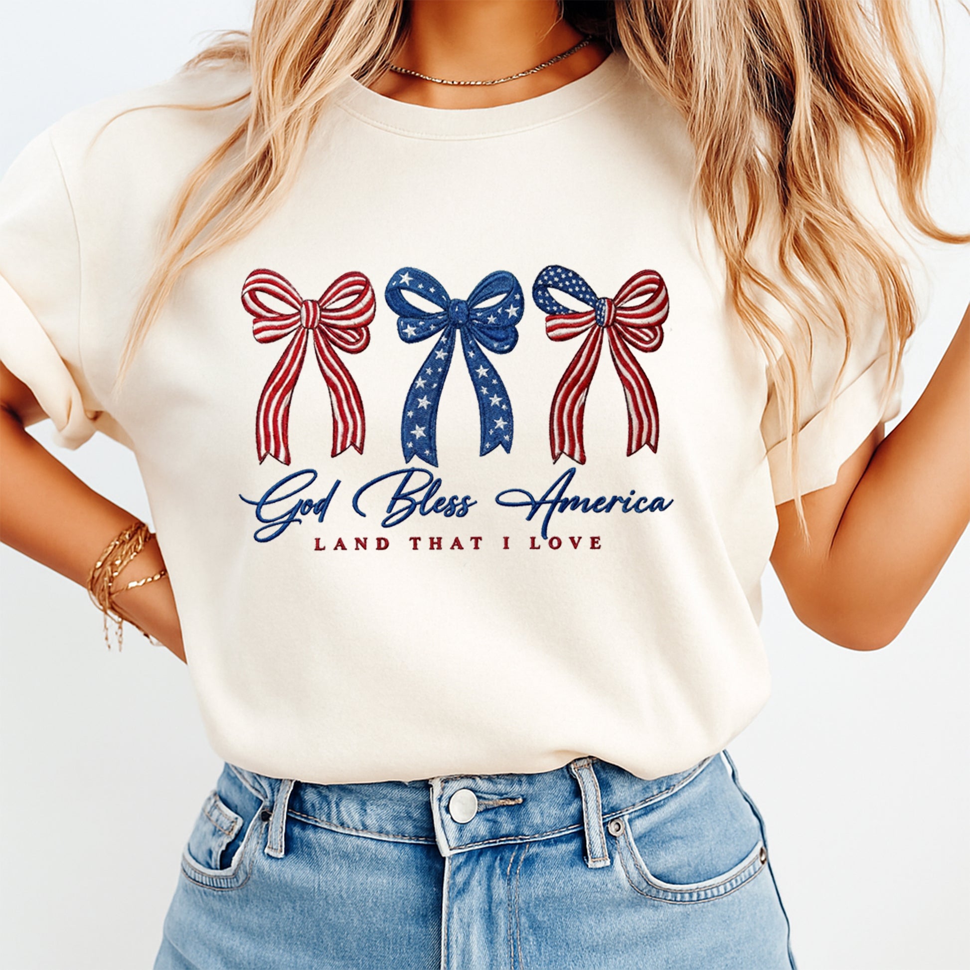 Patriotic bow DTF transfer mockup on cream shirt with God Bless America design