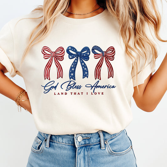 Patriotic bow DTF transfer mockup on cream shirt with God Bless America design