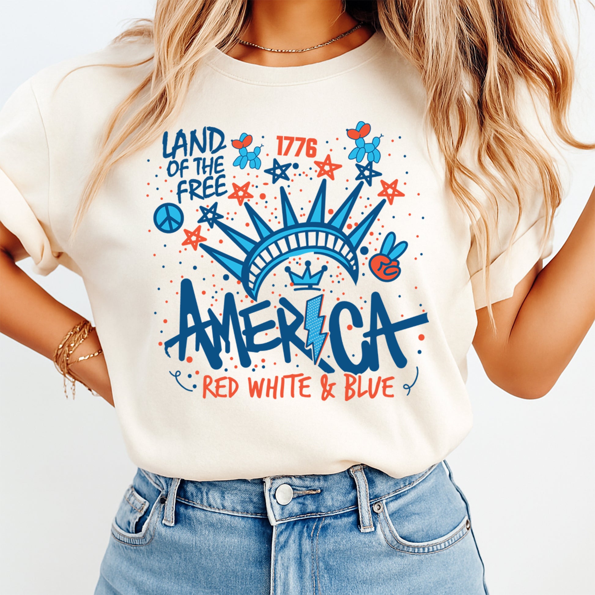 Patriotic America DTF transfer mockup on cream shirt with Land of the Free red white and blue design