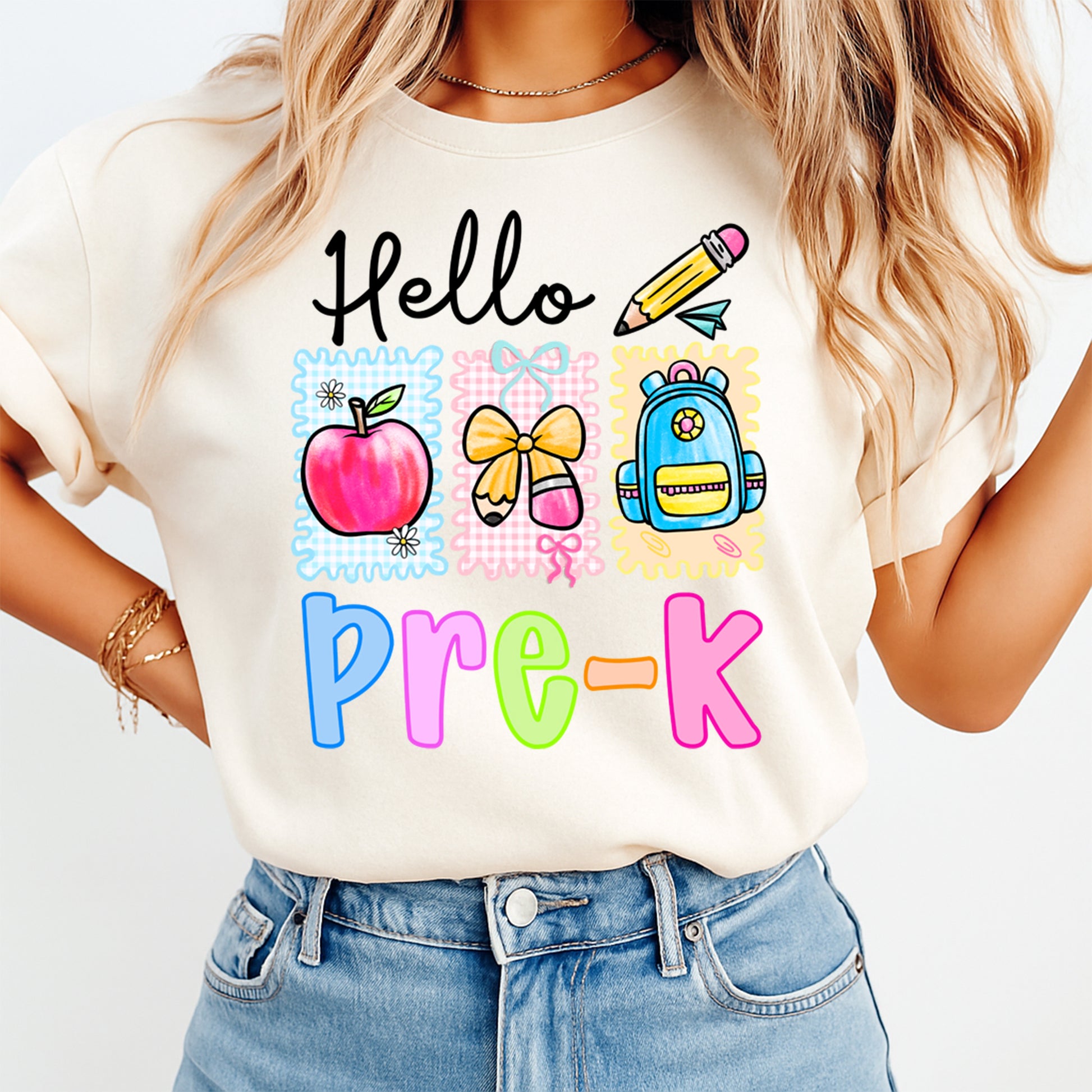 Hello Pre-K teacher shirt mockup with colorful school icons DTF transfer on cream T-shirt