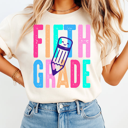 Person wearing a t-shirt with 'FIFTH GRADE' and a pencil graphic on a white background