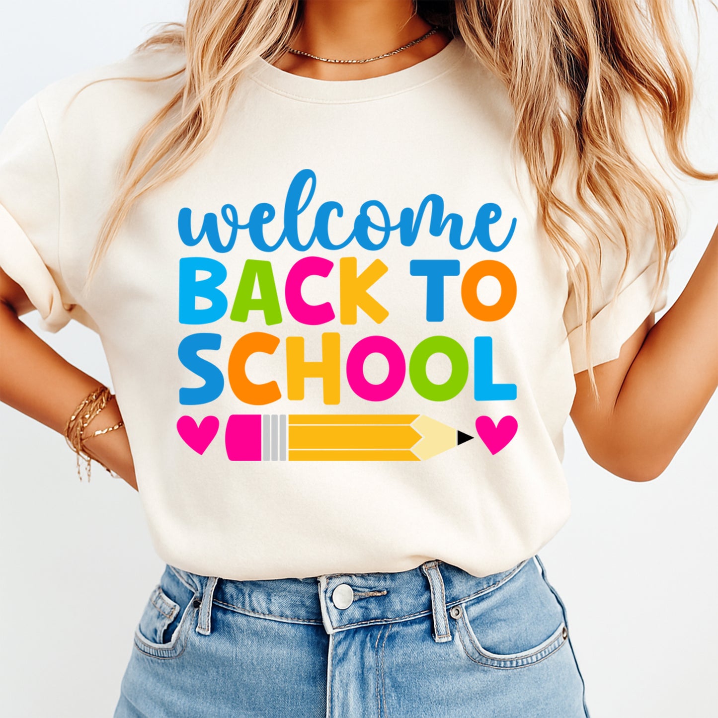 Welcome Back to School DTF transfer mockup on cream shirt with colorful letters, pencil graphic, and pink hearts