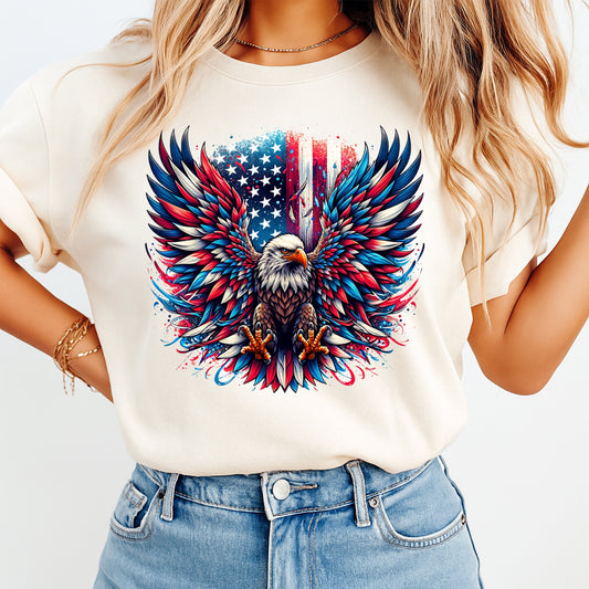 Person wearing a white t-shirt with an eagle and American flag design.