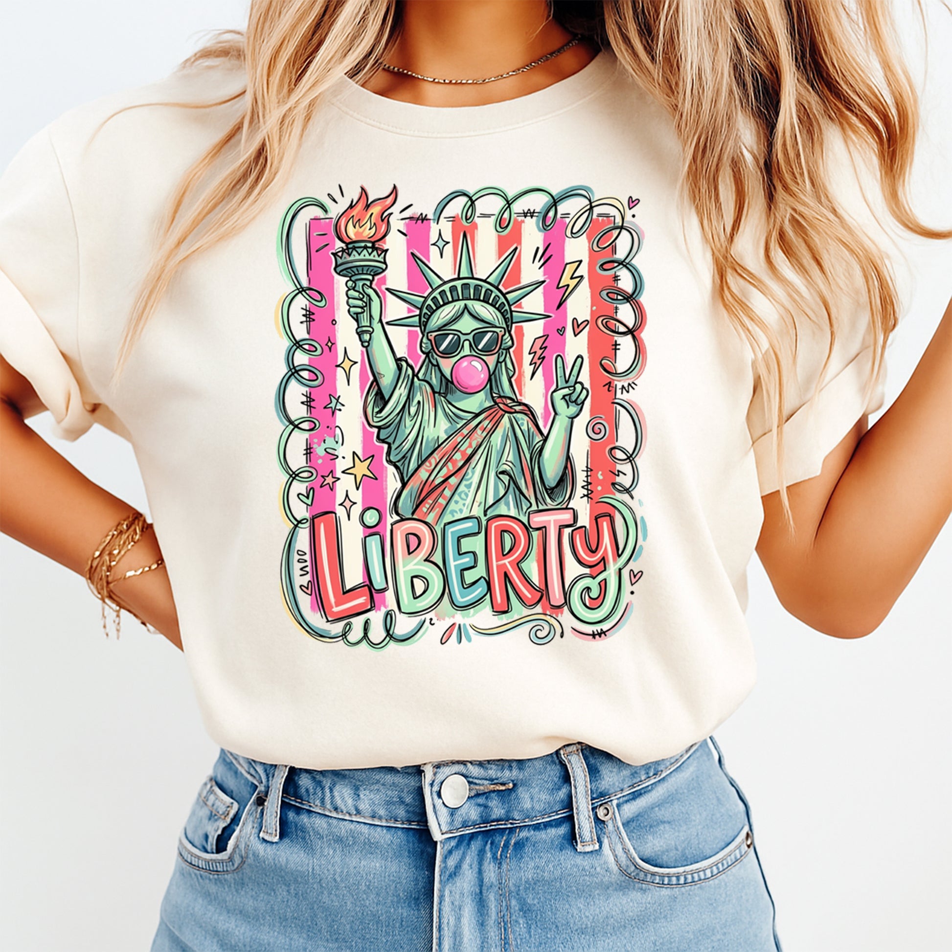 Person wearing a t-shirt with a colorful graphic of the Statue of Liberty and the word 'Liberty'.