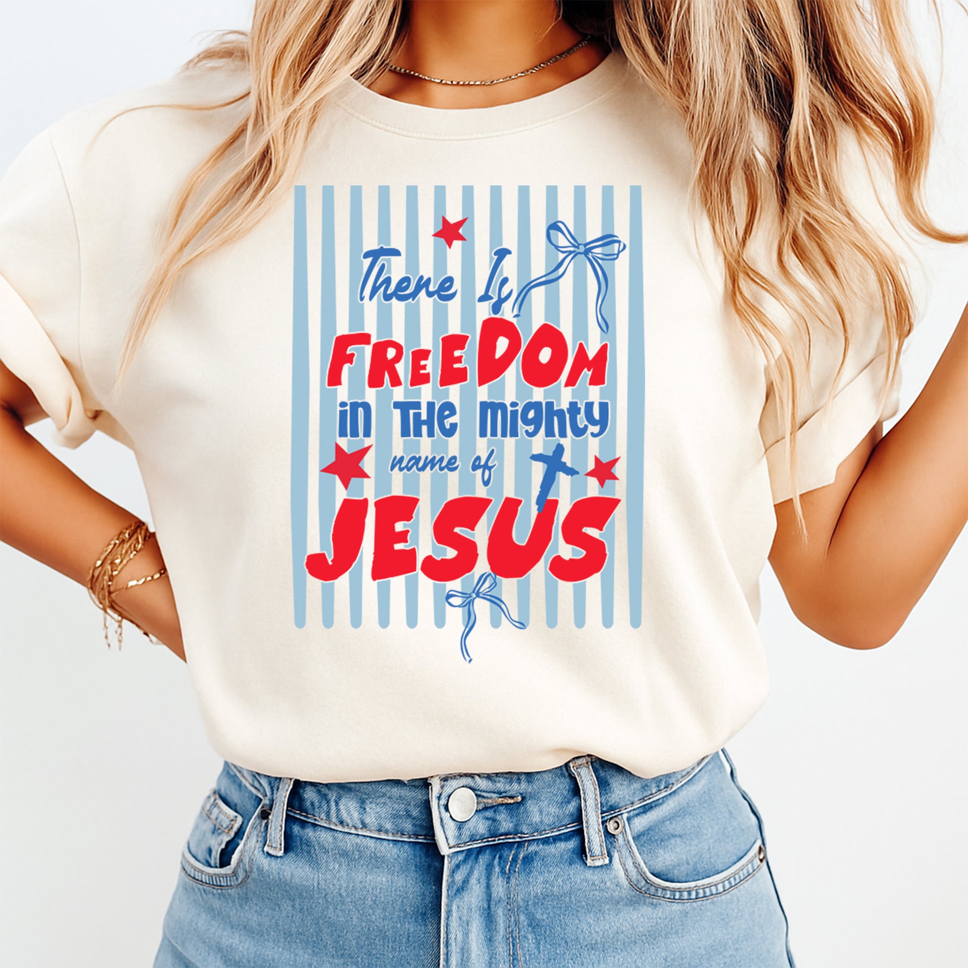 Cream shirt mockup featuring Freedom in Jesus patriotic Christian ready to press DTF transfer for faith shirts
