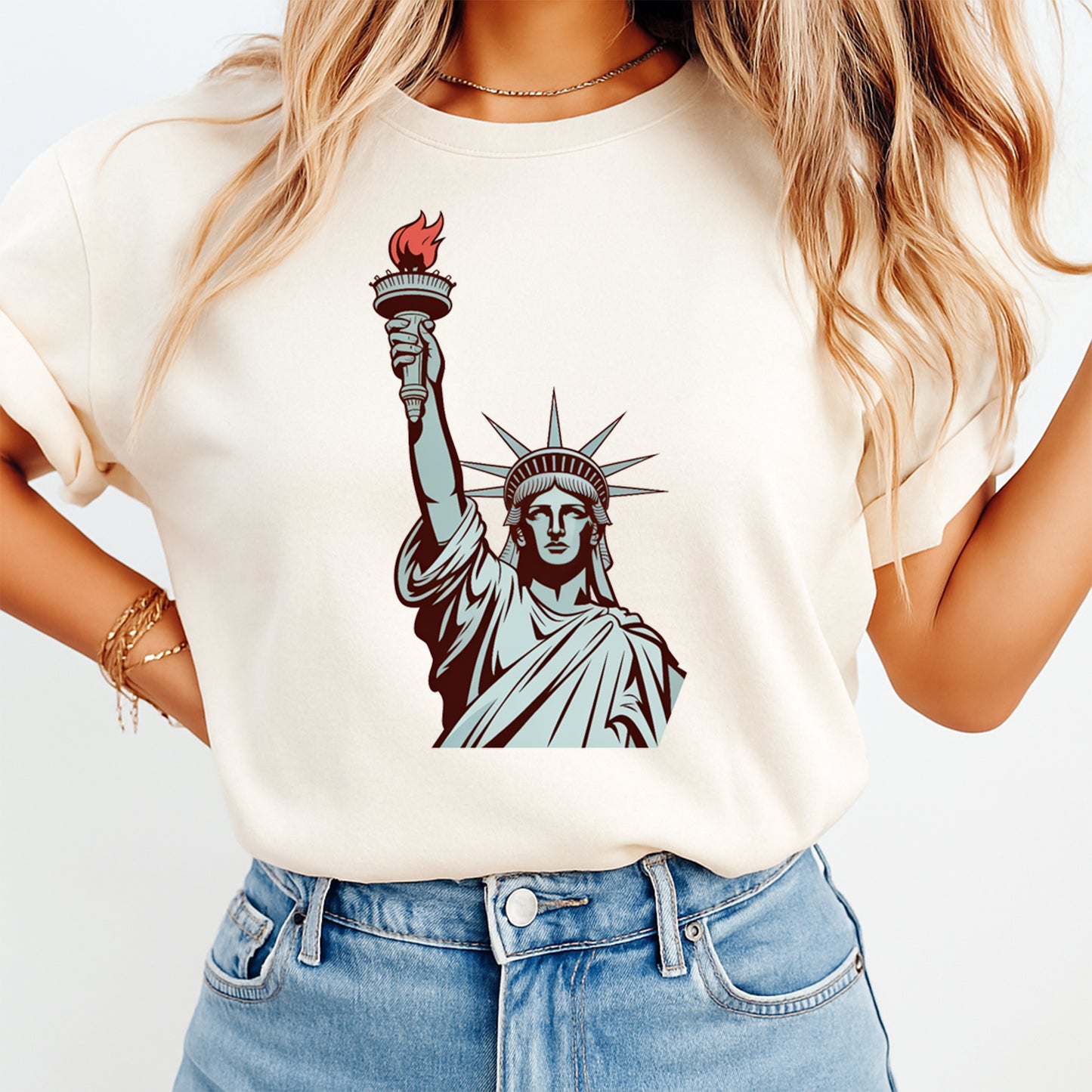 Woman wearing cream shirt with Lady Liberty patriotic DTF transfer design