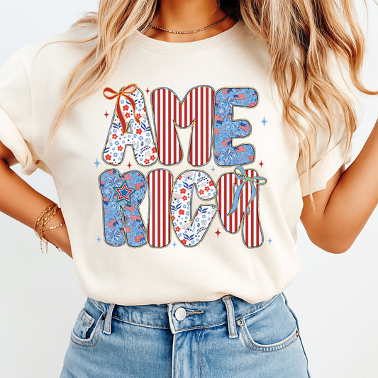 Woman wearing cream shirt with patriotic America DTF transfer design in red white and blue