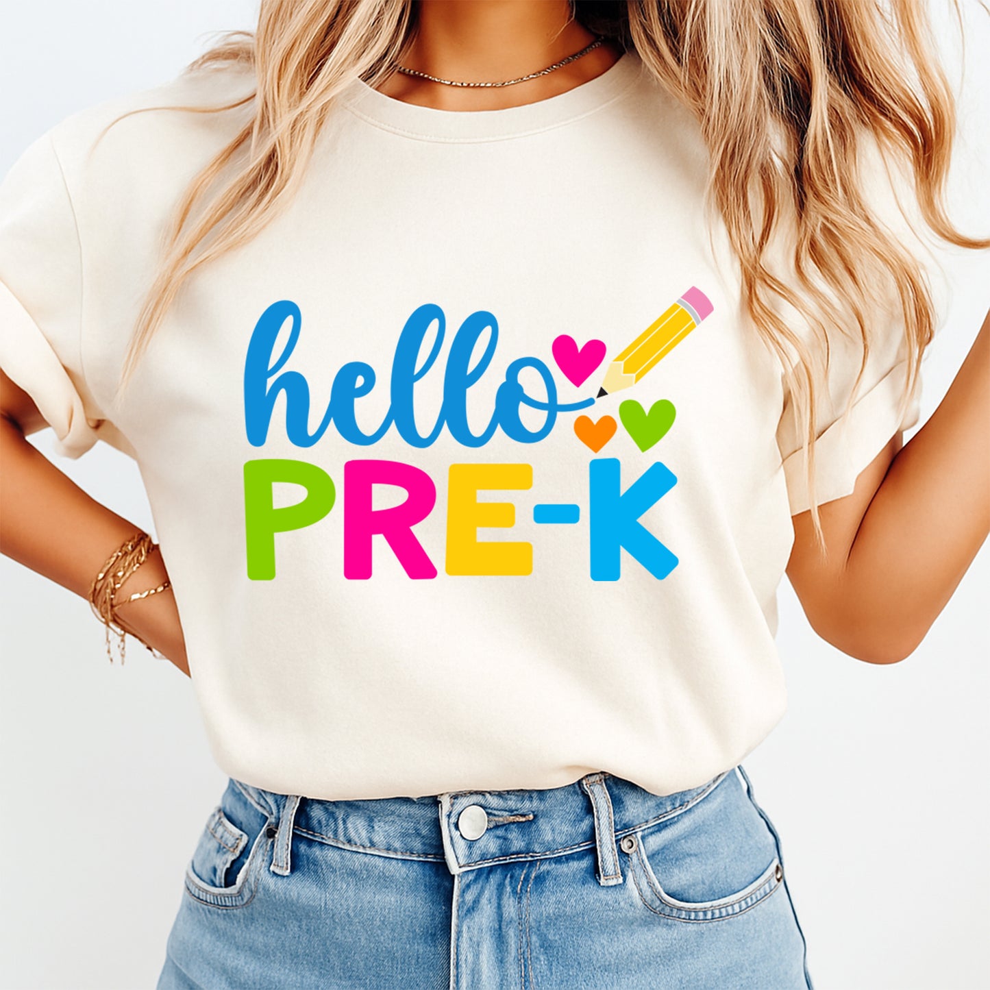 Person wearing a white t-shirt with 'hello PRE-K' text and colorful graphics.