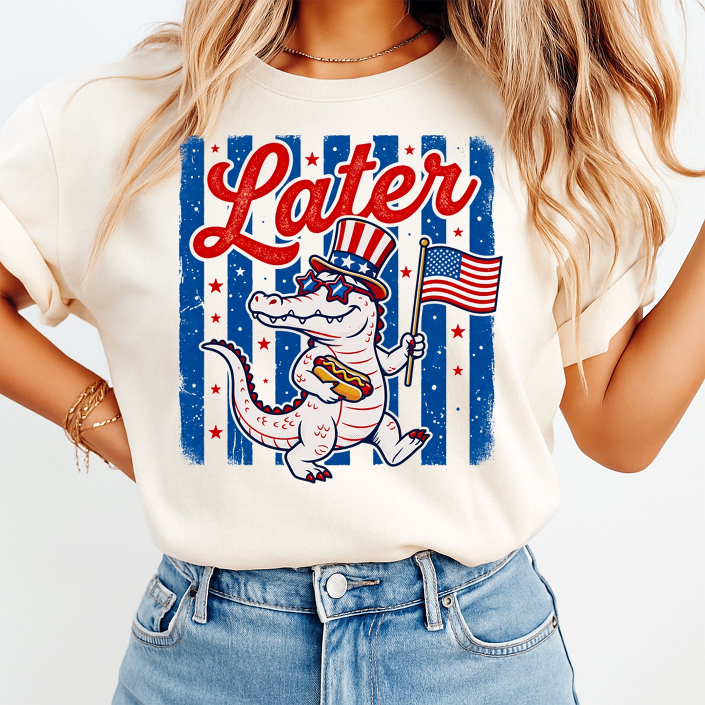 Woman wearing cream shirt with Fourth of July Later Gator DTF transfer featuring patriotic alligator and American flag