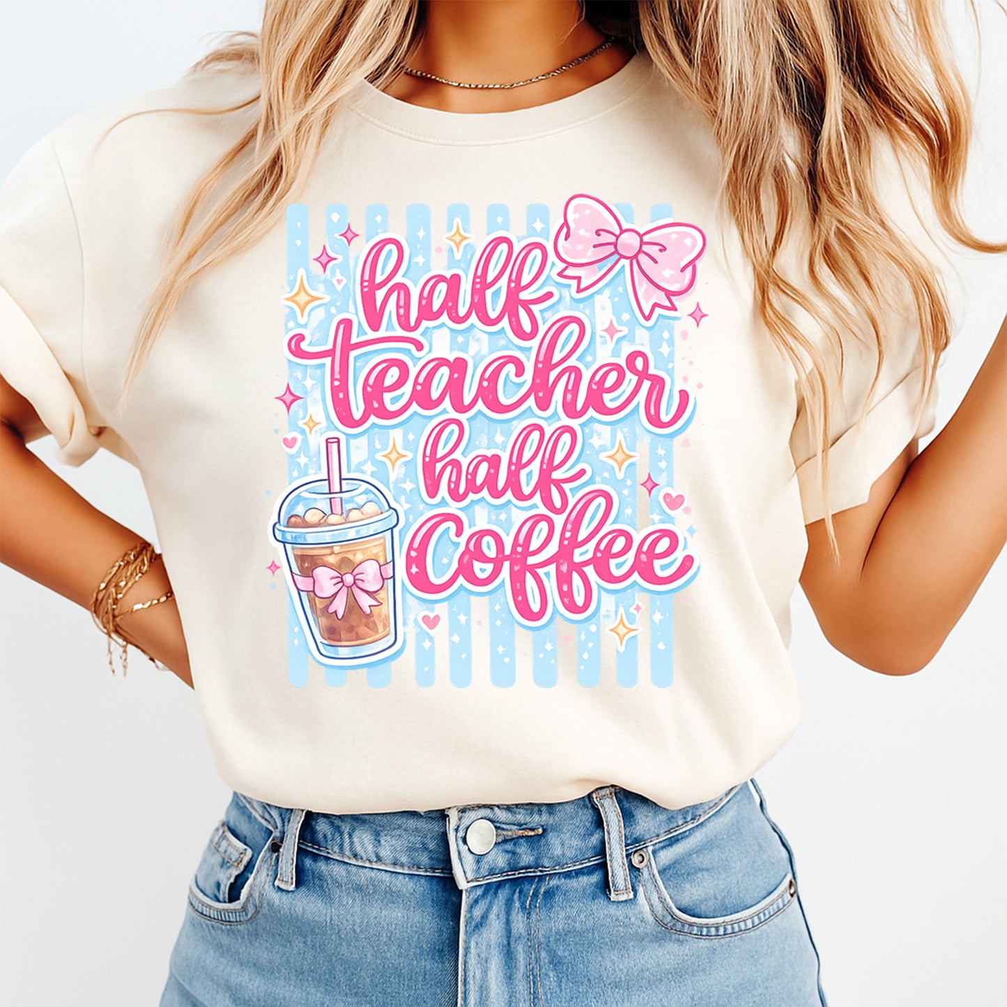 Person wearing a t-shirt with 'half teacher half coffee' design on a plain background