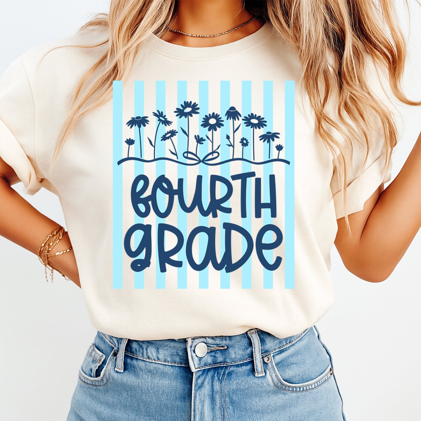 Person wearing a t-shirt with 'Fourth Grade' design on a white background