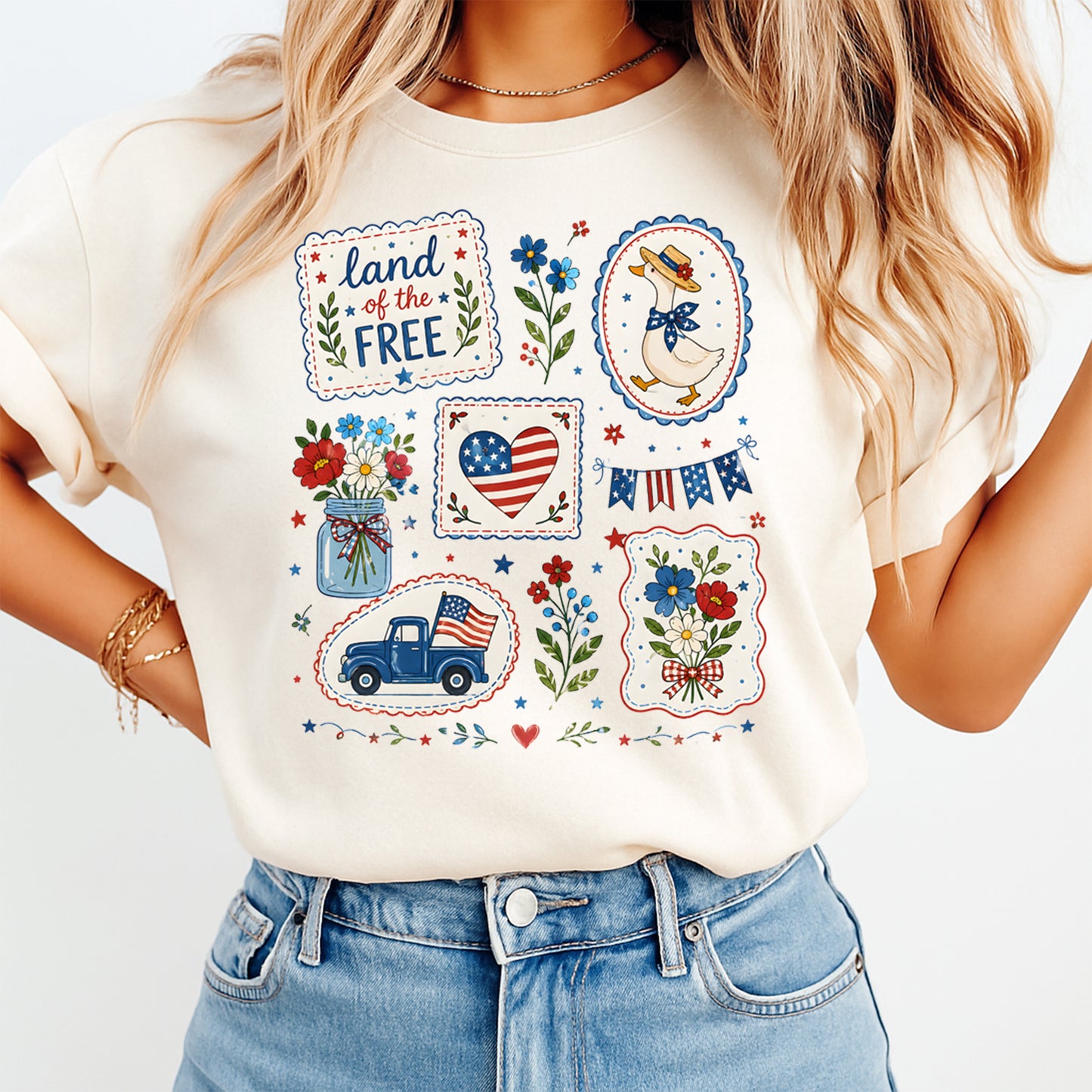 Woman wearing cream shirt with Fourth of July Land of the Free DTF transfer featuring patriotic patchwork icons