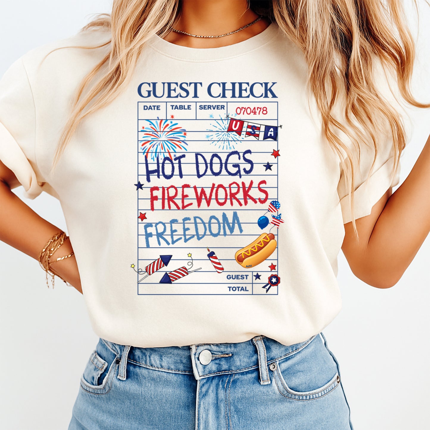 Woman wearing cream shirt with Fourth of July Hot Dogs Fireworks Freedom DTF transfer featuring guest check design