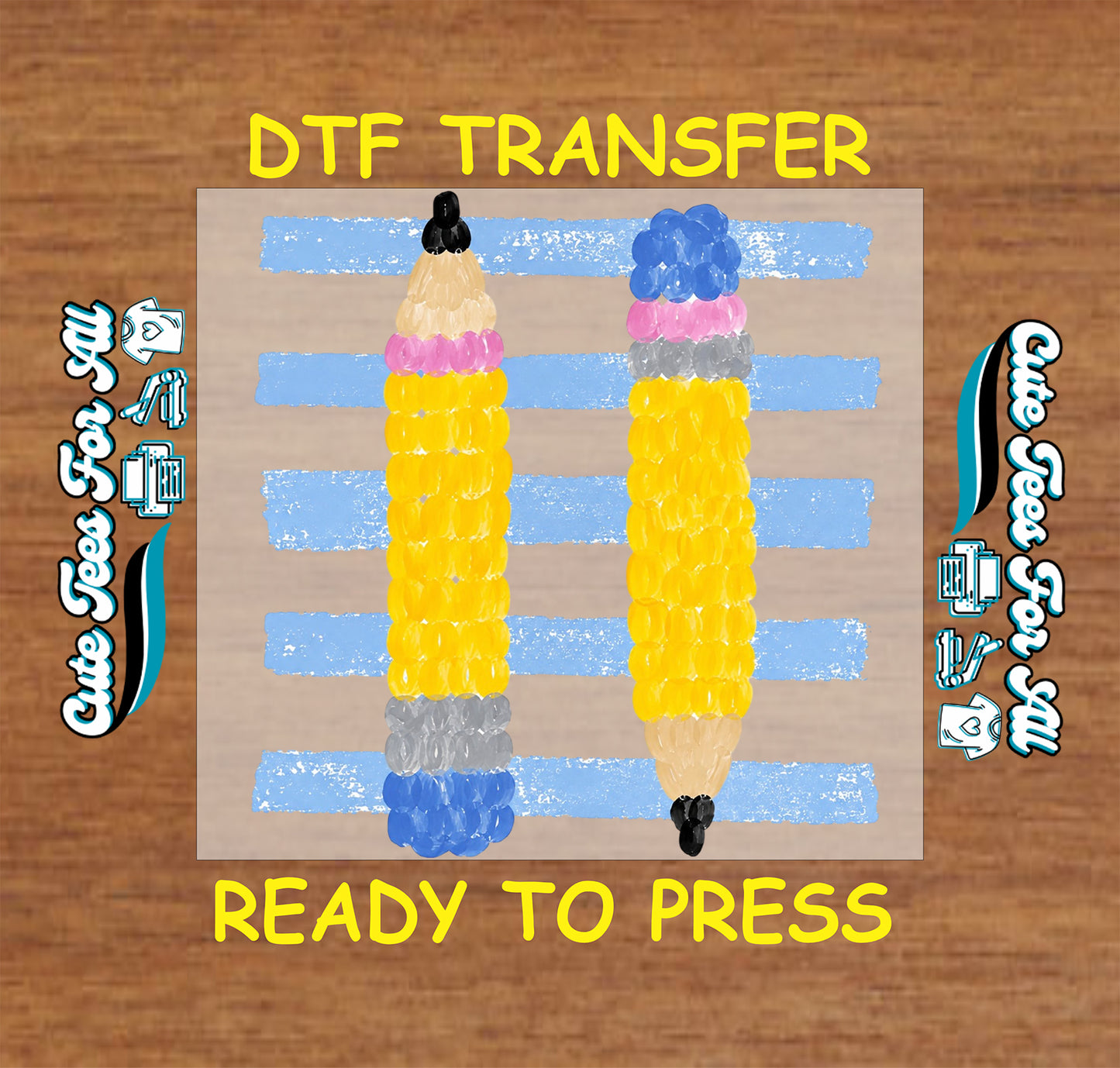 DTF transfer with two colorful pencils on a wooden background