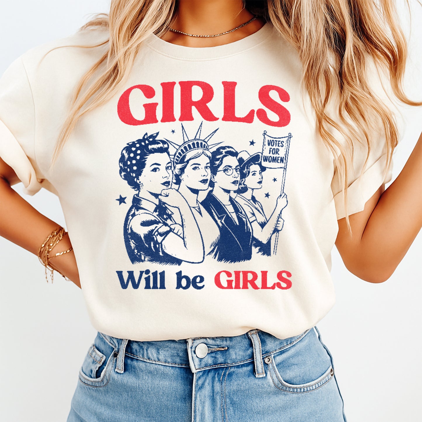 Person wearing a t-shirt with 'GIRLS Will be GIRLS' text and graphic design.