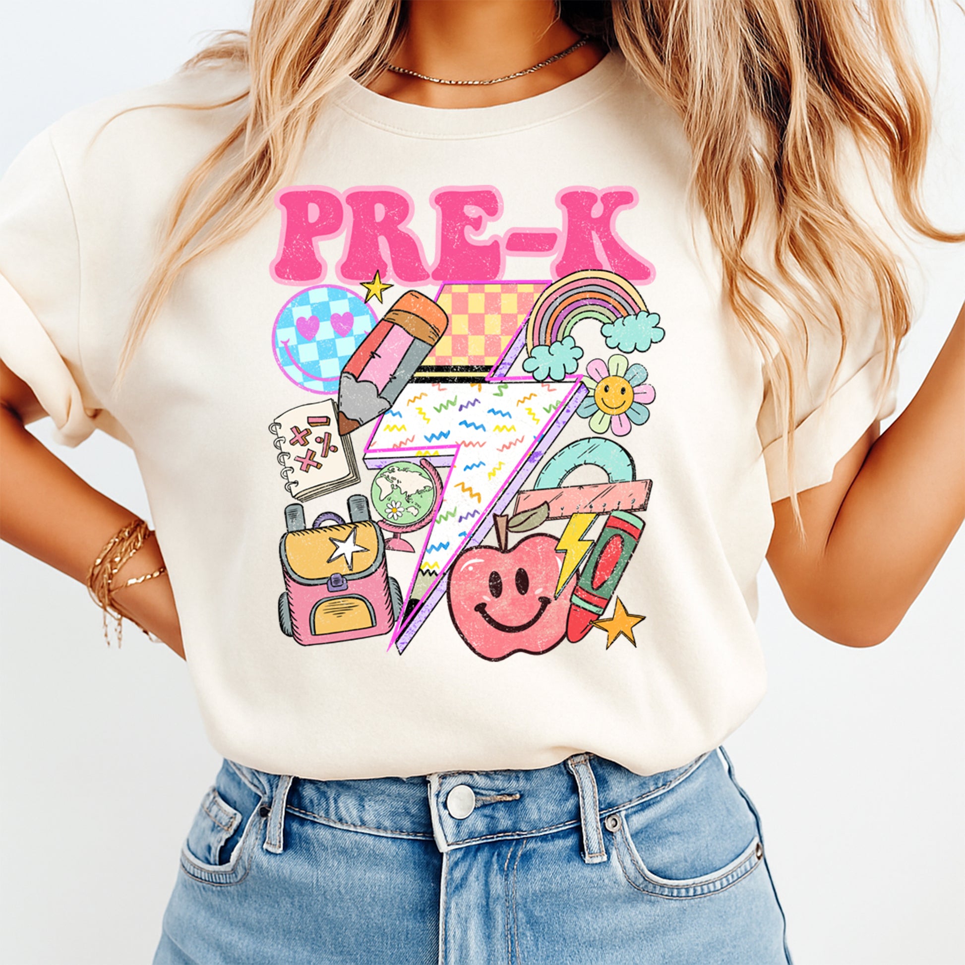 Person wearing a white t-shirt with colorful 'PRE-K' graphics and text.