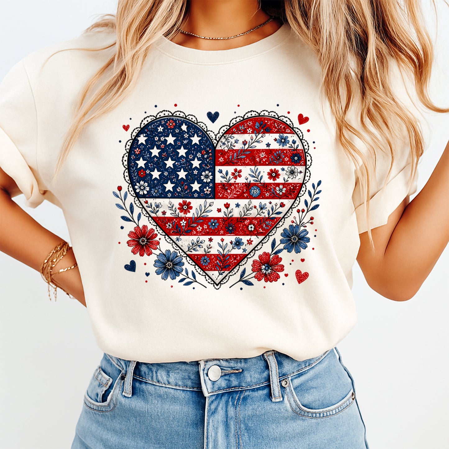 Person wearing a white t-shirt with a heart-shaped American flag design.