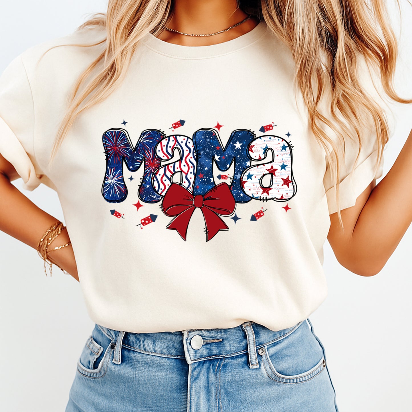 Person wearing a white t-shirt with 'Mama' graphic design on a plain background