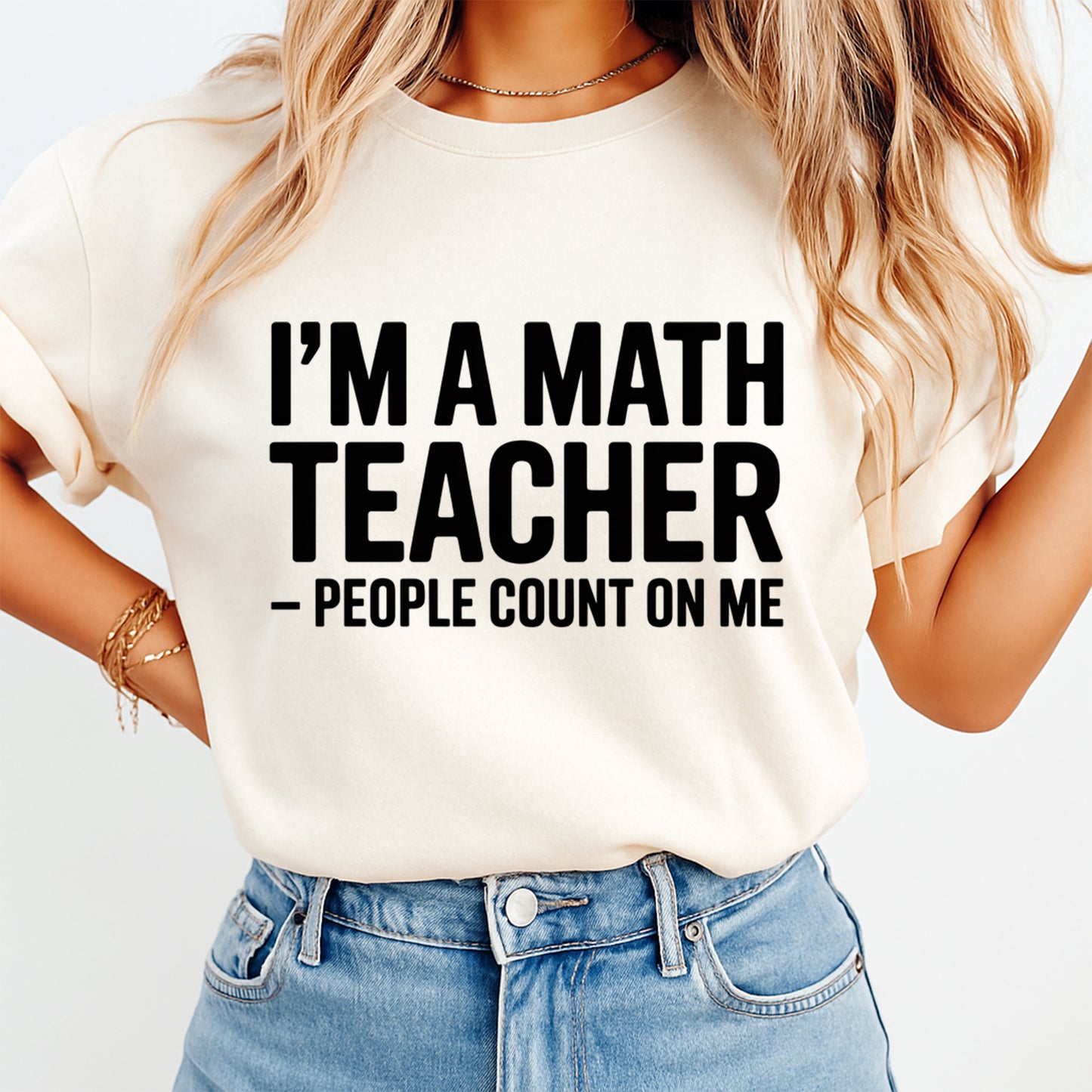 Person wearing a white t-shirt with 'I'm a math teacher - people count on me' text.