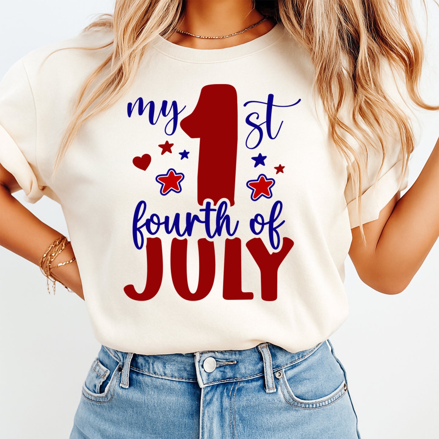 Person wearing a white t-shirt with 'my 1st fourth of July' text on a plain background