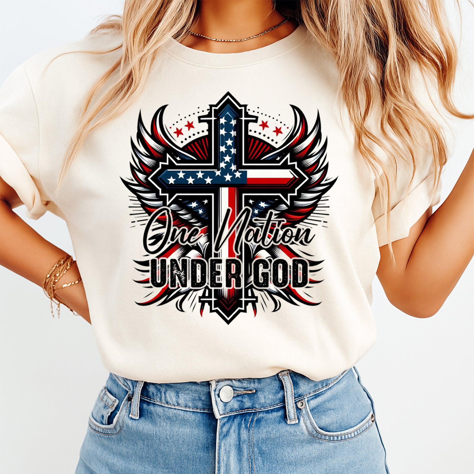 Person wearing a white t-shirt with a patriotic design and 'One Nation Under God' text.