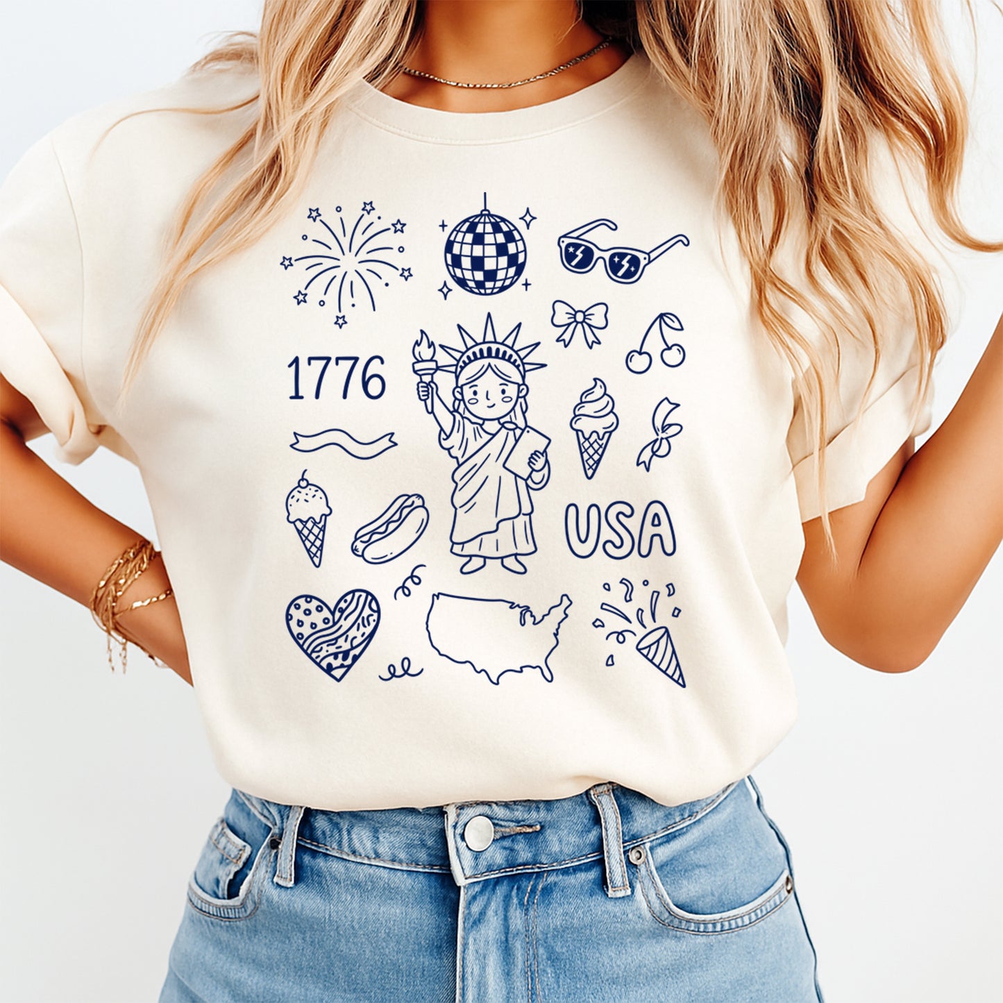 Person wearing a white t-shirt with USA-themed graphics on a plain background