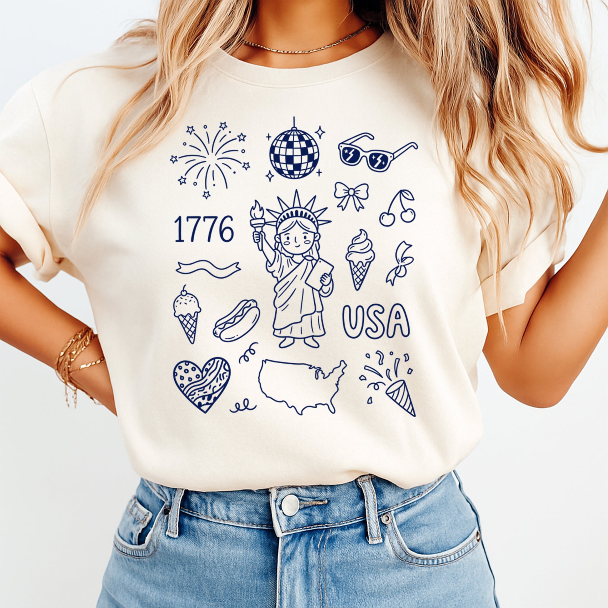 Person wearing a white t-shirt with USA-themed graphics on a plain background