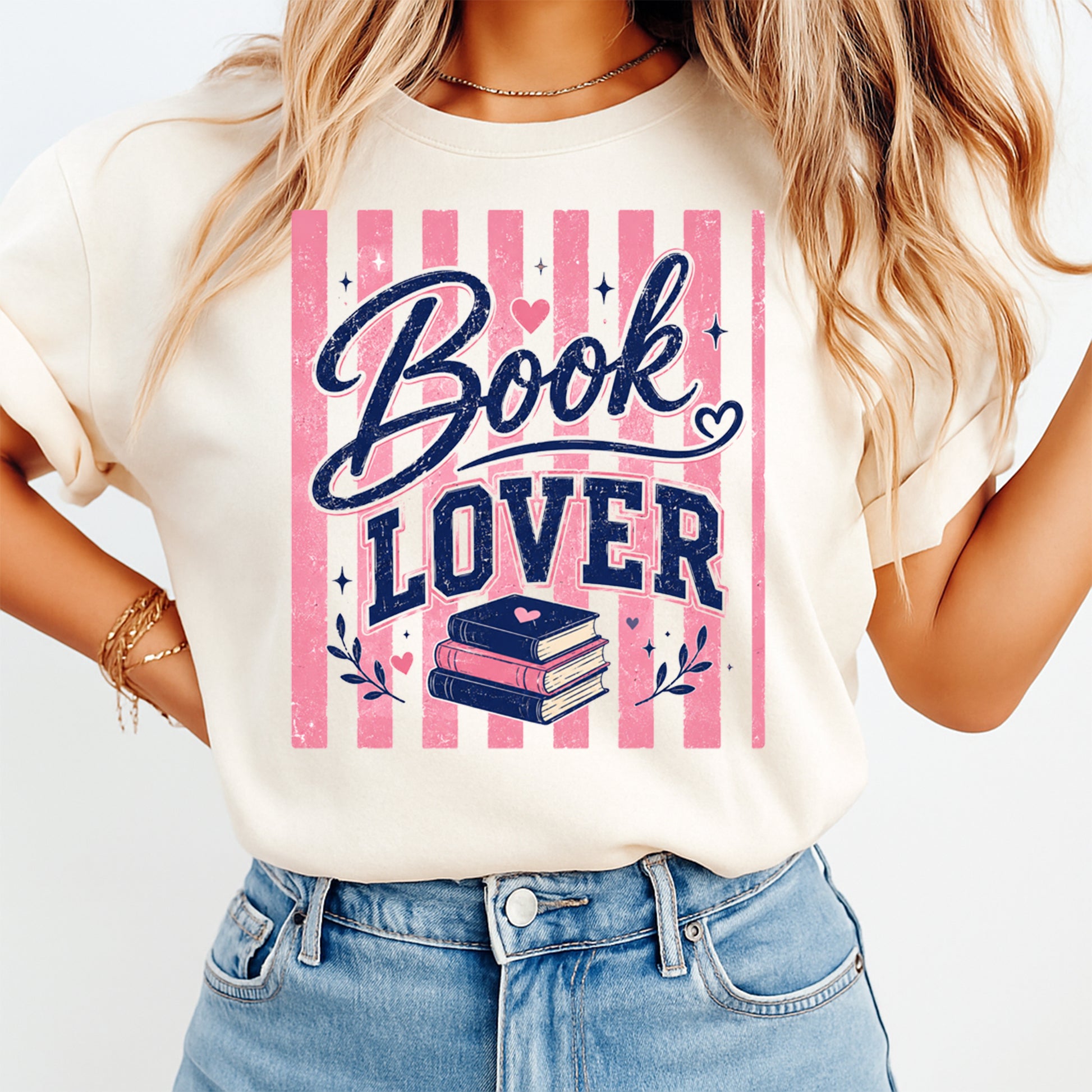 Person wearing a t-shirt with 'Book Lover' design on a plain background