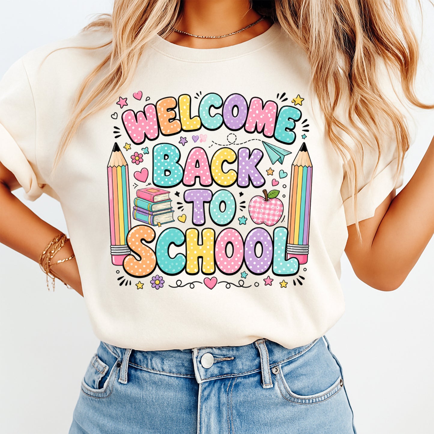 Person wearing a white t-shirt with 'Welcome Back to School' text and colorful graphics.