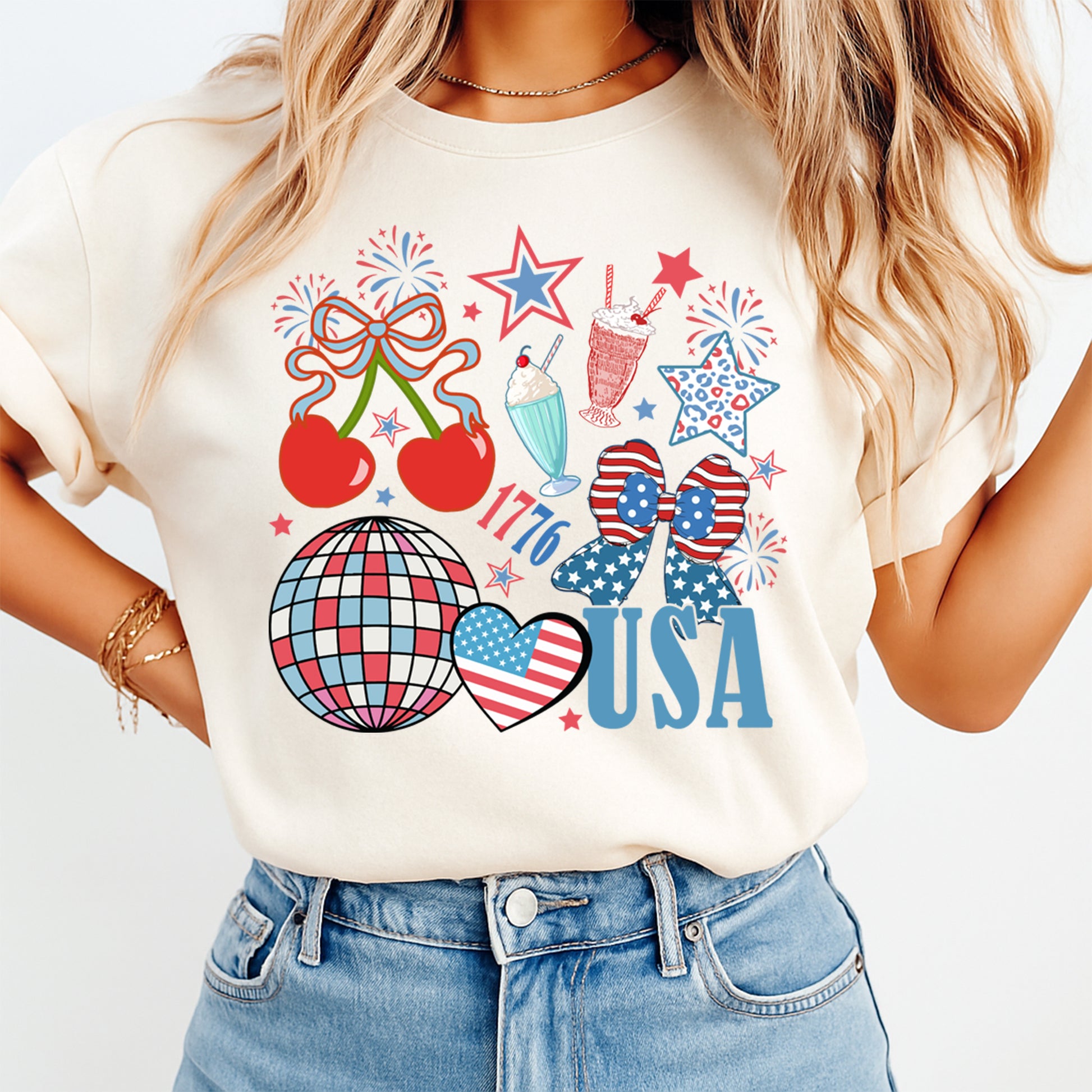 Person wearing a white t-shirt with 4th of July-themed graphics on a plain background