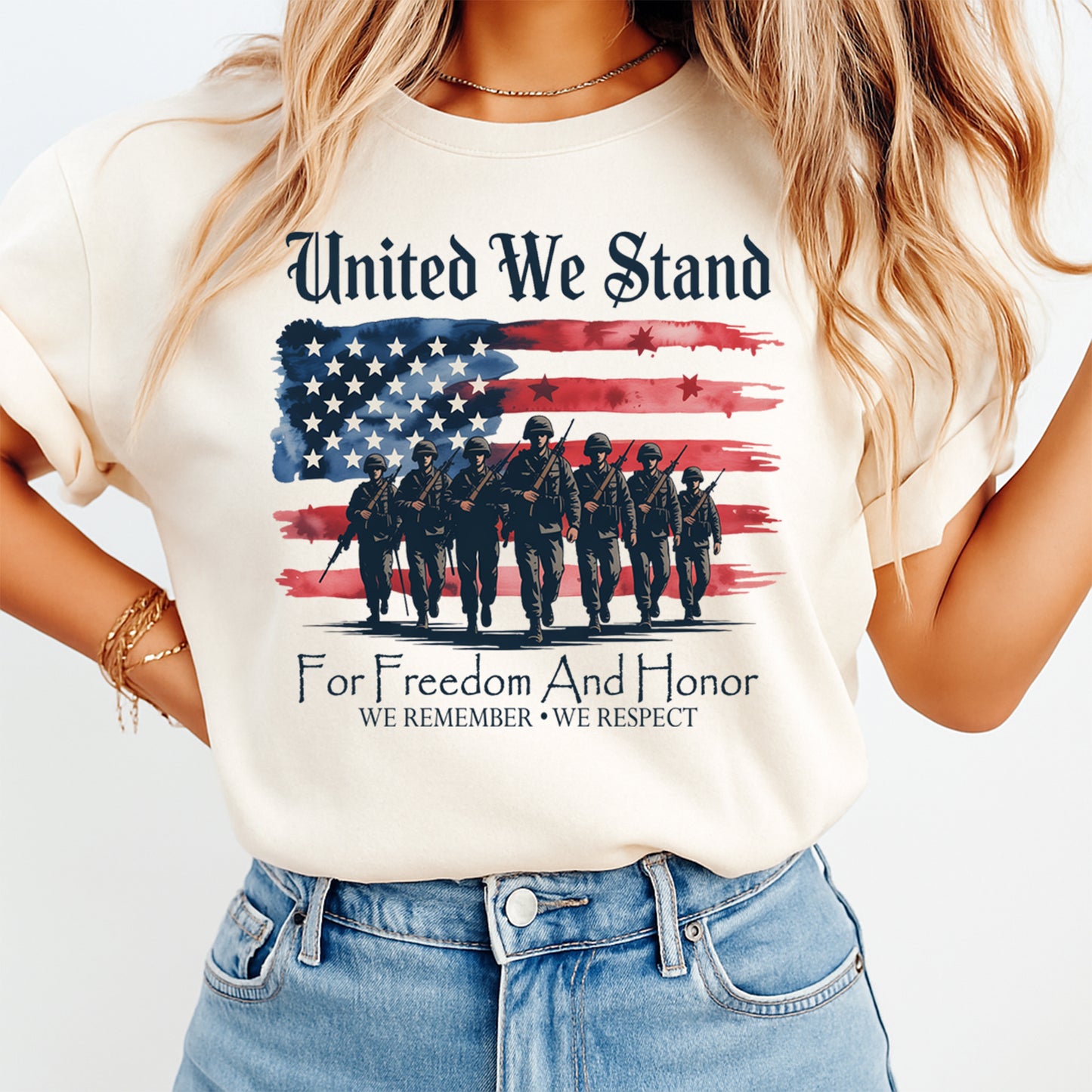 Person wearing a t-shirt with an American flag and military-themed design.