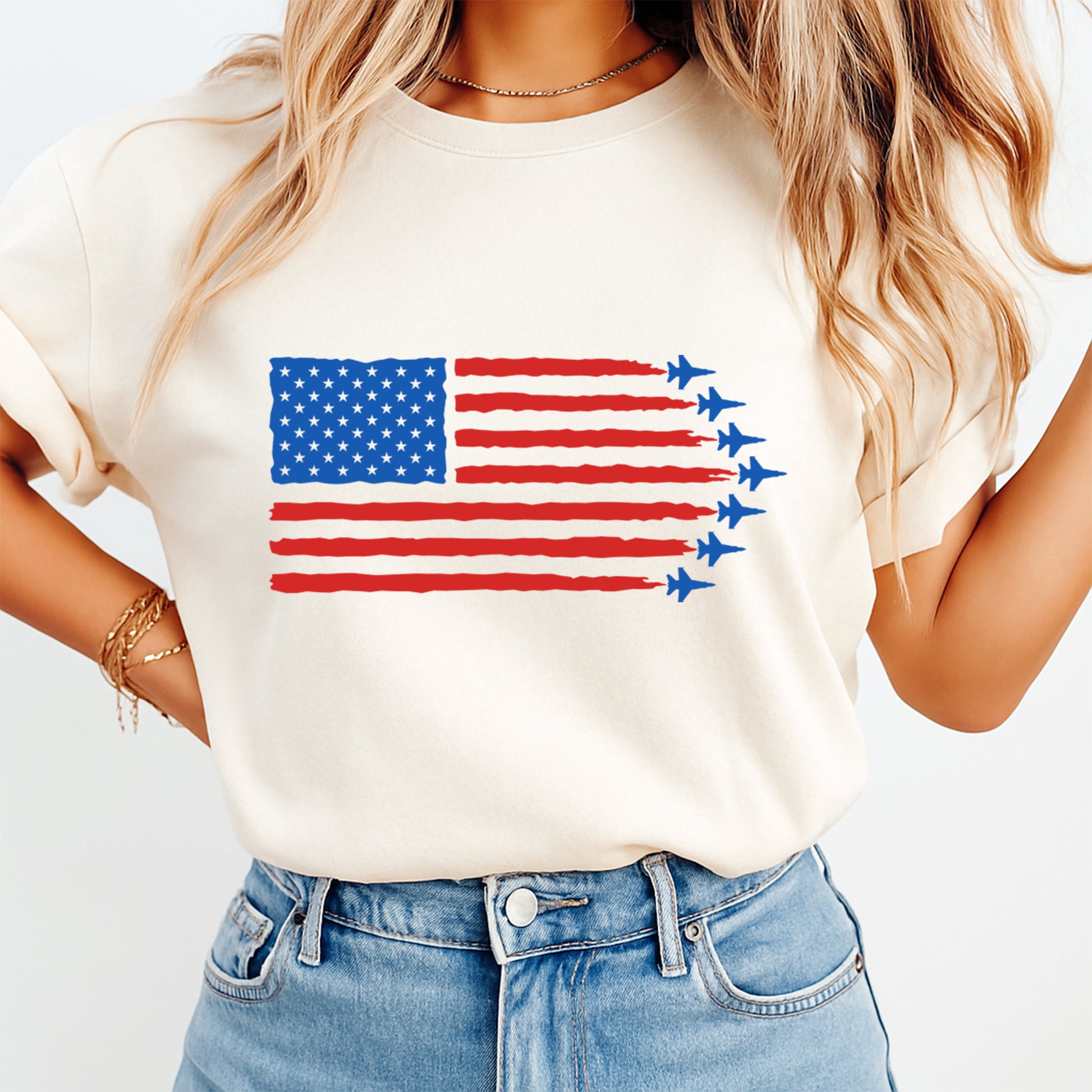 Fourth of July American flag DTF transfer mockup on cream shirt with red stripes, blue stars, and fighter jet silhouettes in a patriotic design.
