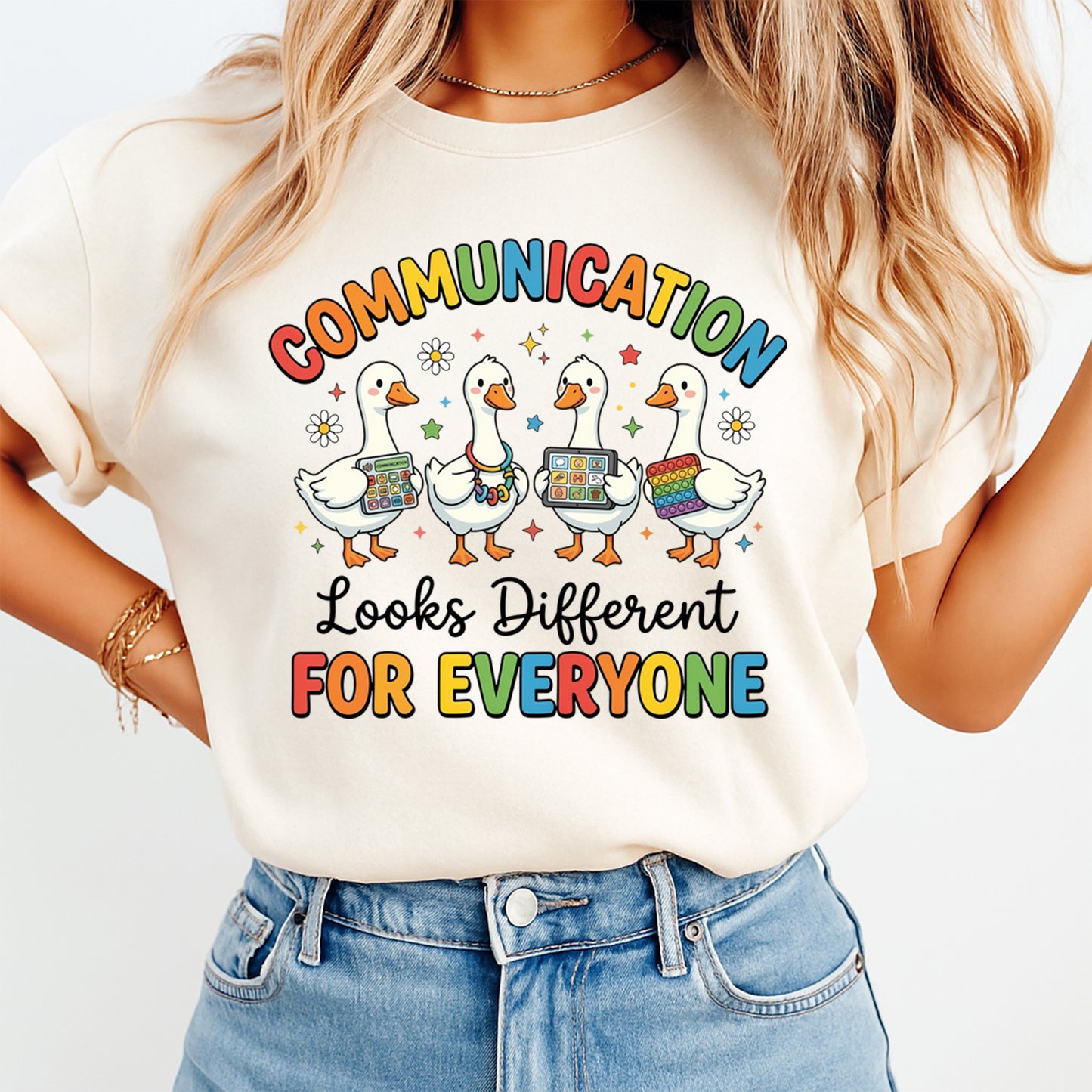 Real lifestyle mockup of a Communication Looks Different For Everyone DTF transfer on a shirt, ready to press iron on design for DIY shirts