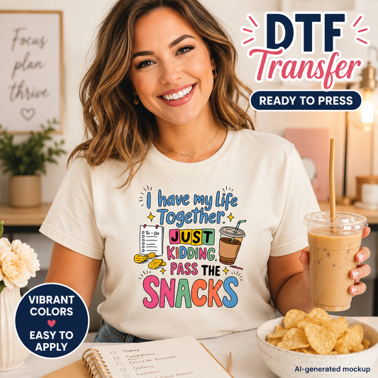 Woman wearing a t-shirt with a colorful design, holding a drink and snacks, with 'DTF Transfer' text overlay.