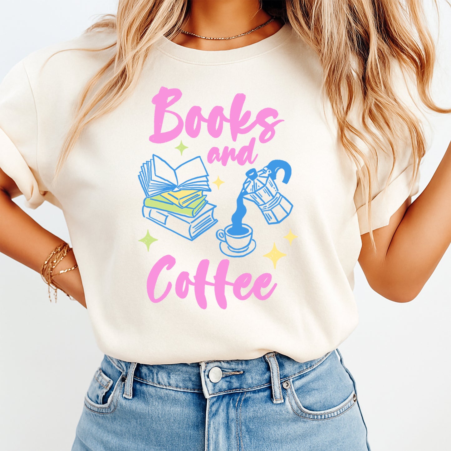 Person wearing a white t-shirt with 'Books and Coffee' design on a plain background