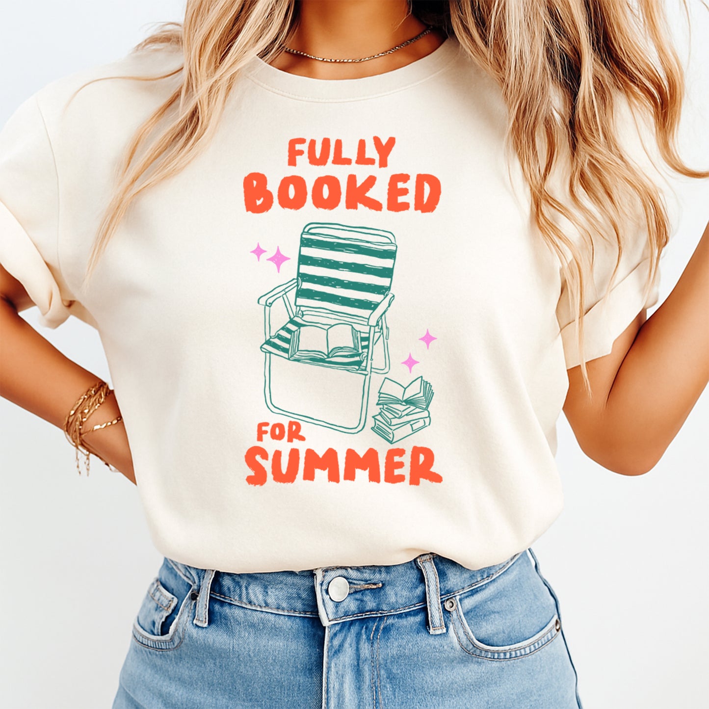 Person wearing a t-shirt with 'Fully Booked for Summer' text and chair graphic.