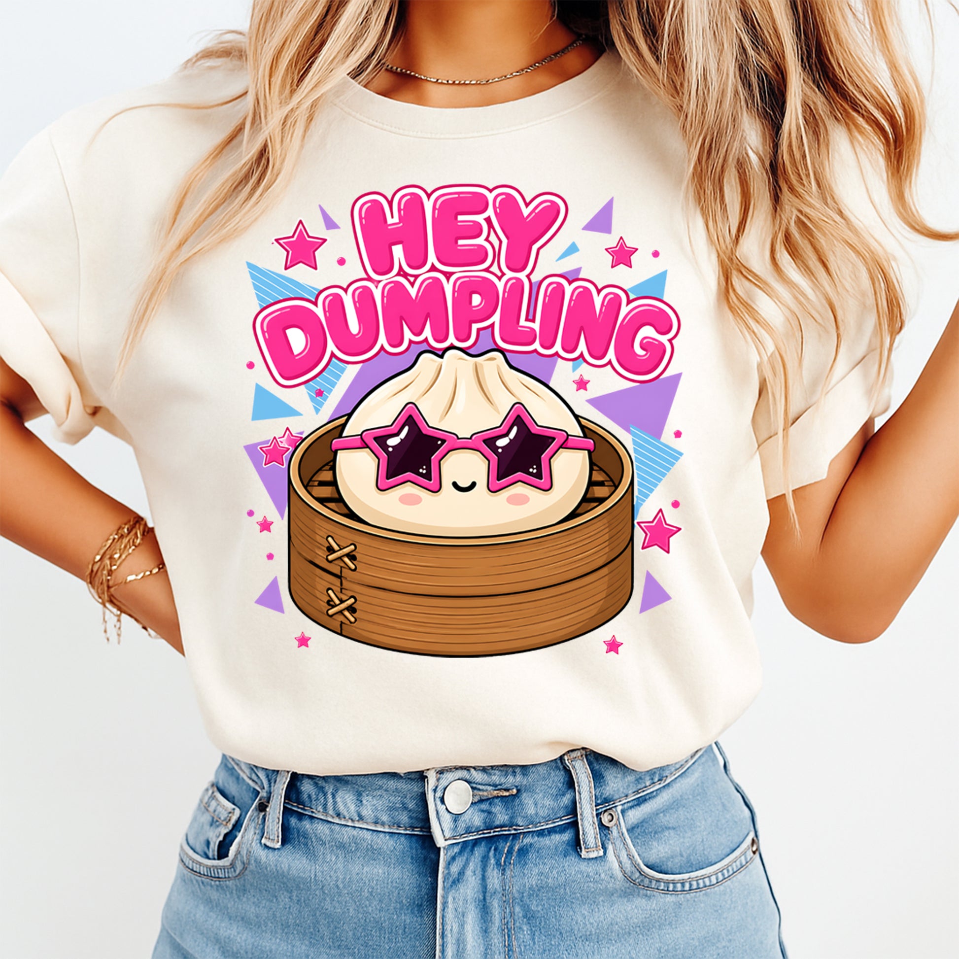 Person wearing a 'Hey Dumpling' t-shirt with a cartoon dumpling design.