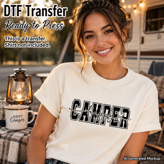 Woman wearing a 'Happy Camper' t-shirt with outdoor setting