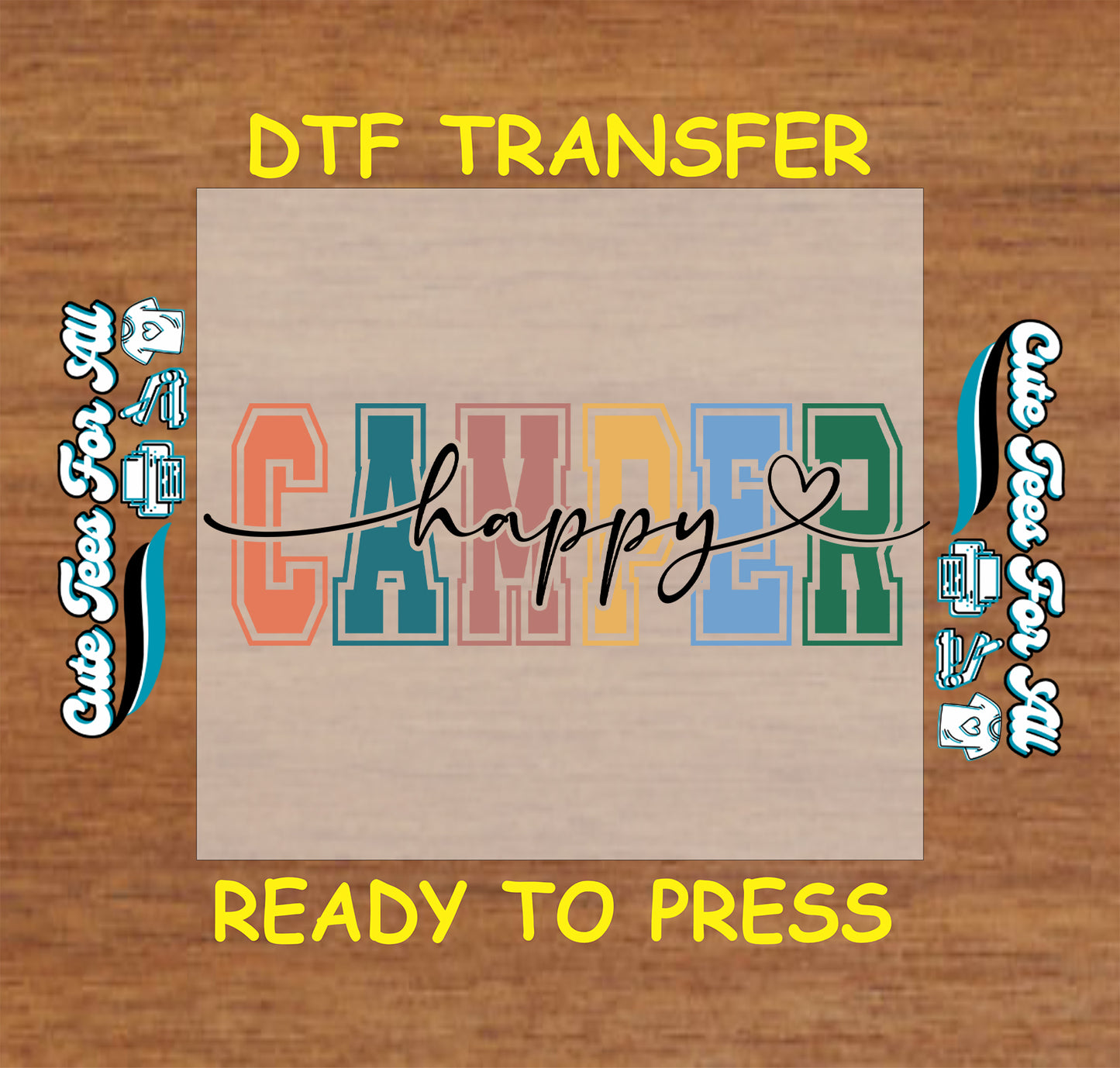 DTF transfer with 'Happy Camper' text on a wooden background