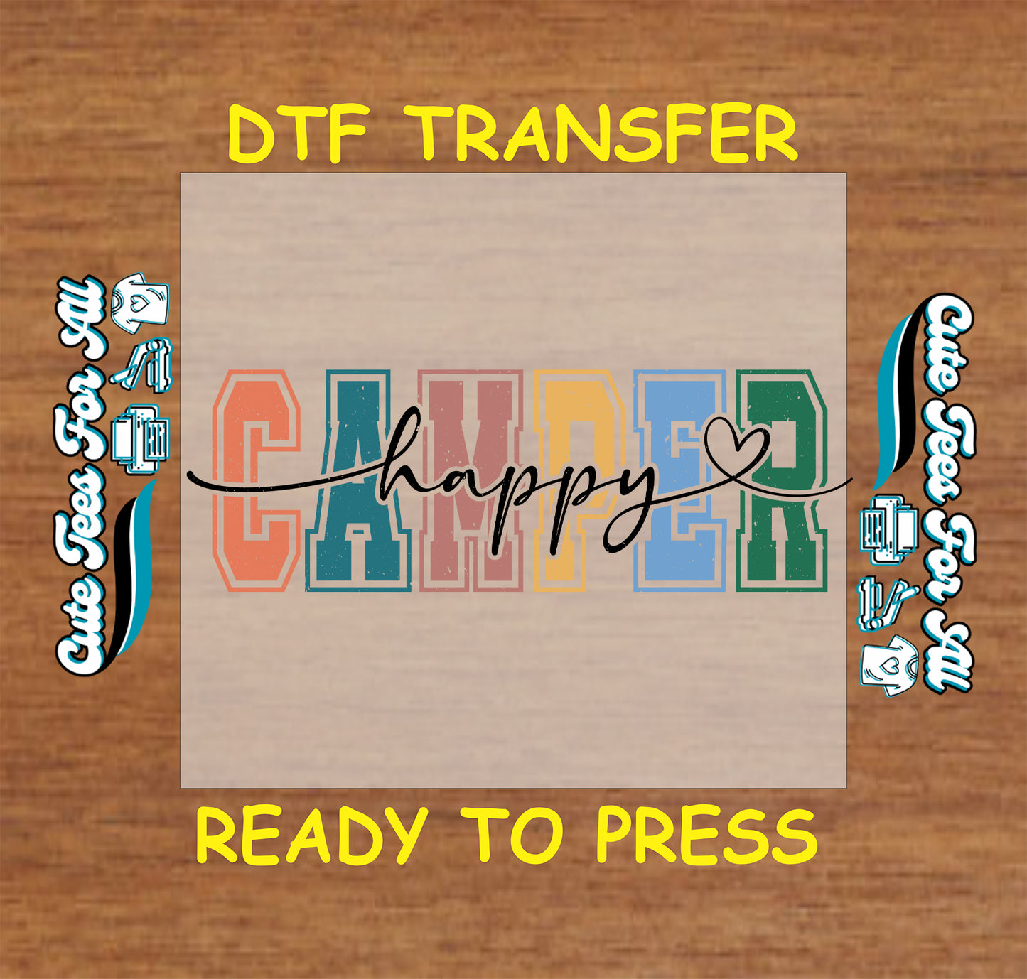 DTF transfer with 'Happy Camper' text on a wooden background