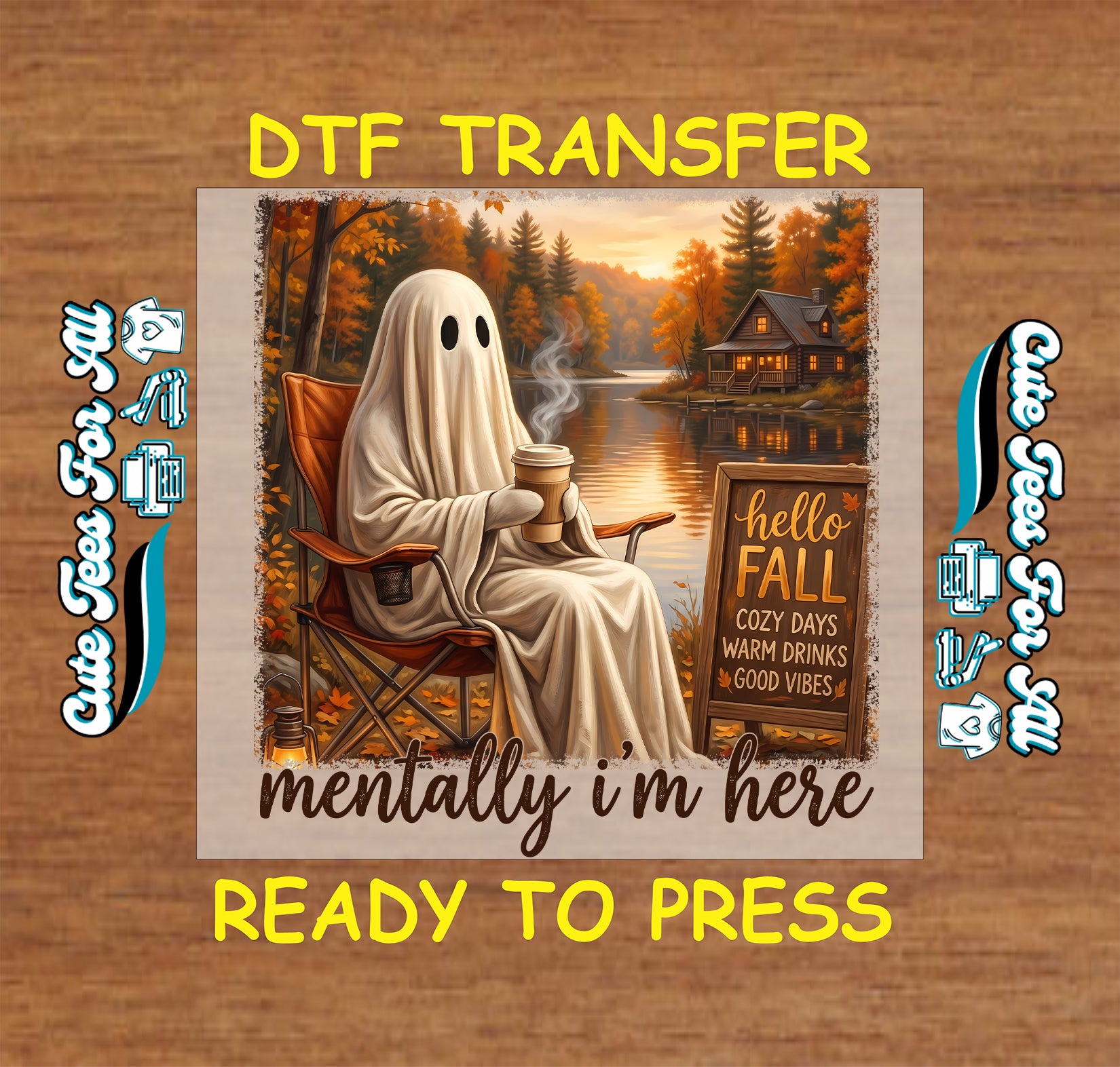 A DTF transfer design preview on a wood-textured background. The central artwork shows a ghost-like figure in a white sheet sitting in an orange camp chair by a lake at sunset, holding a mug, with a sign reading 'hello FALL COZY DAYS WARM DRINKS GOOD VIBES.