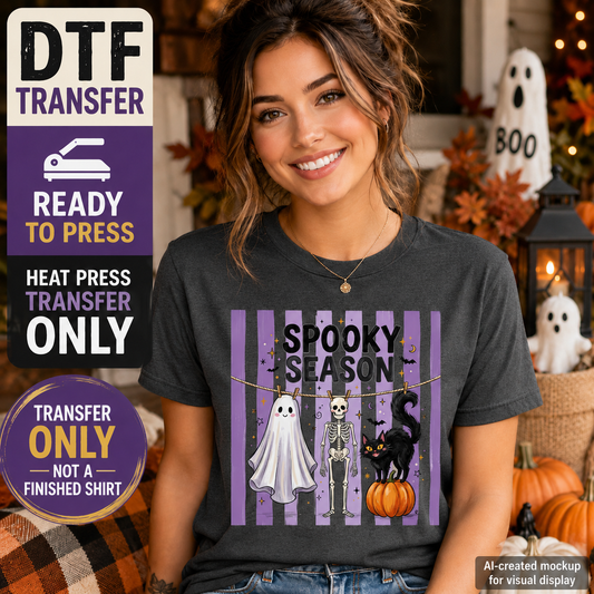 Woman wearing a charcoal Spooky Season Halloween shirt with ghost, skeleton, black cat, and pumpkin DTF transfer design