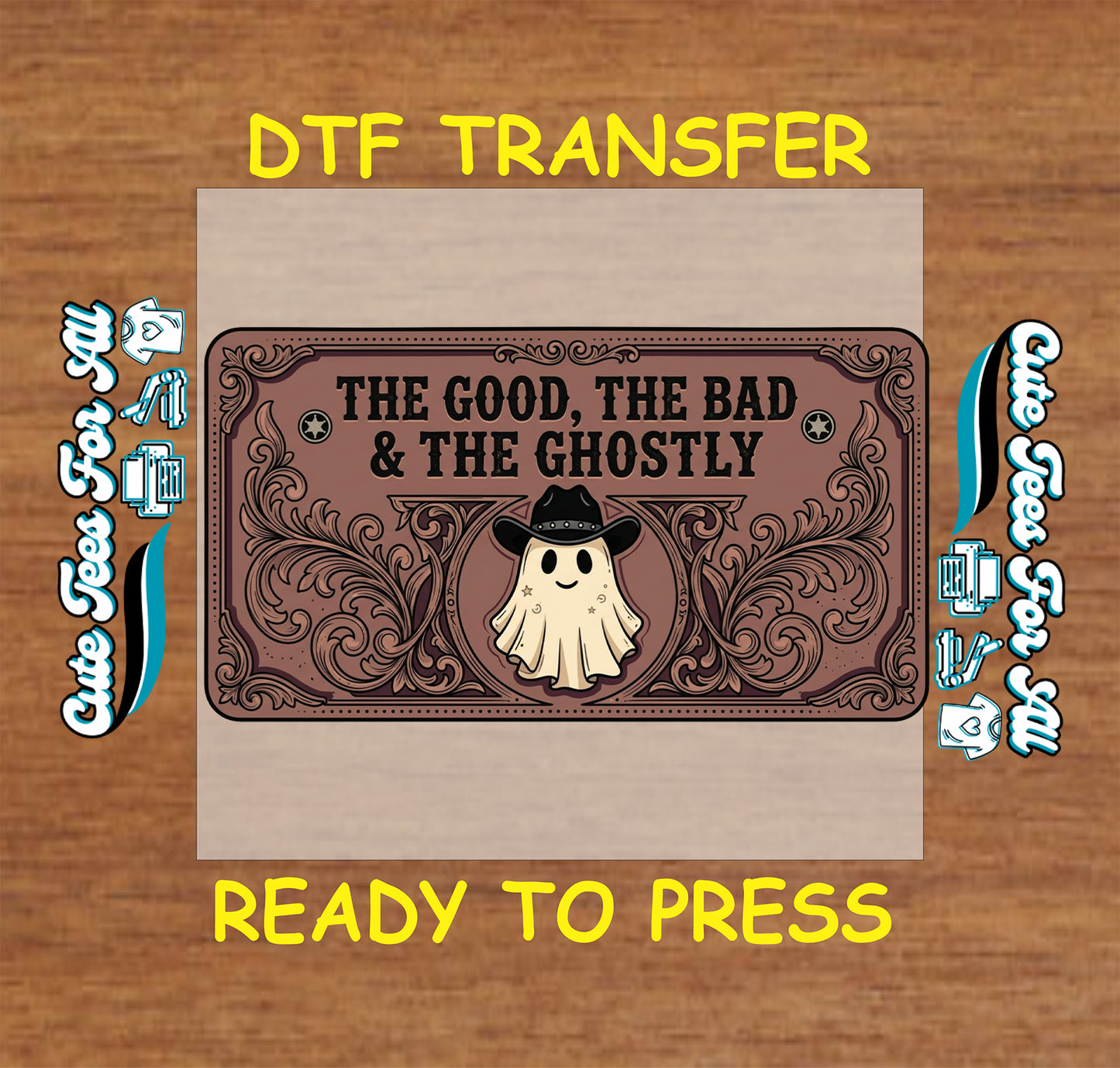 A DTF transfer design preview on a wood background, featuring a brown ornate label with the text 'THE GOOD, THE BAD & THE GHOSTLY' and a cartoon ghost wearing a black hat. Yellow text above and below reads 'DTF TRANSFER' and 'READY TO PRESS'.
