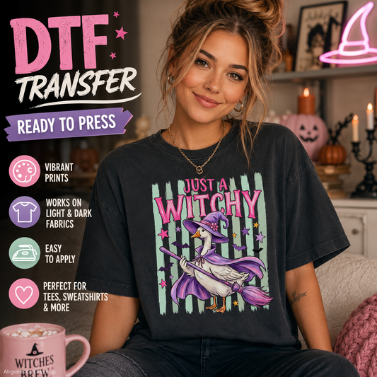 Woman wearing a black shirt with the Just a Witchy Goose Halloween DTF transfer design.