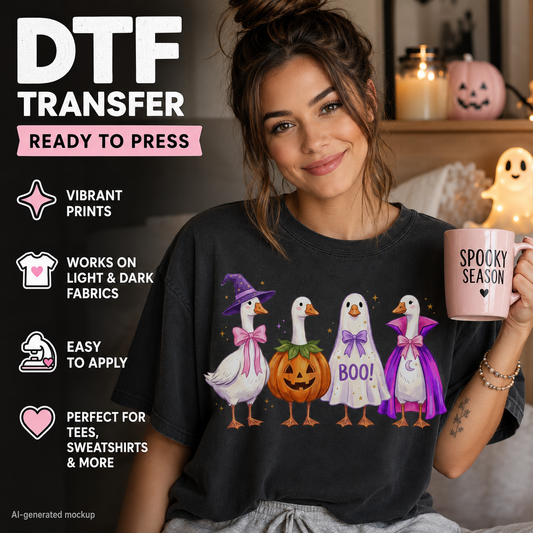A woman wearing a black t-shirt with a colorful Halloween graphic of three geese in witch costumes and a jack-o'-lantern, holding a pink mug that says 'SPOOKY Season'. The left side features promotional text for a 'DTF TRANSFER' service.