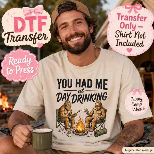 A man wearing a beige t-shirt with a funny campfire graphic of two sasquatches sitting by a fire, surrounded by promotional badges for a DTF transfer mockup.
